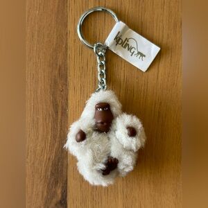 Kipling beige furry monkey gorilla keychain charm Katie